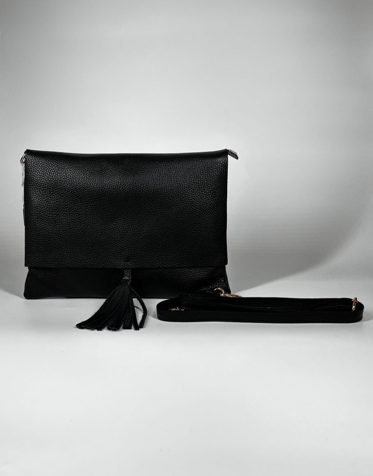 Borsa in vera pelle con nappina con frange - Nera