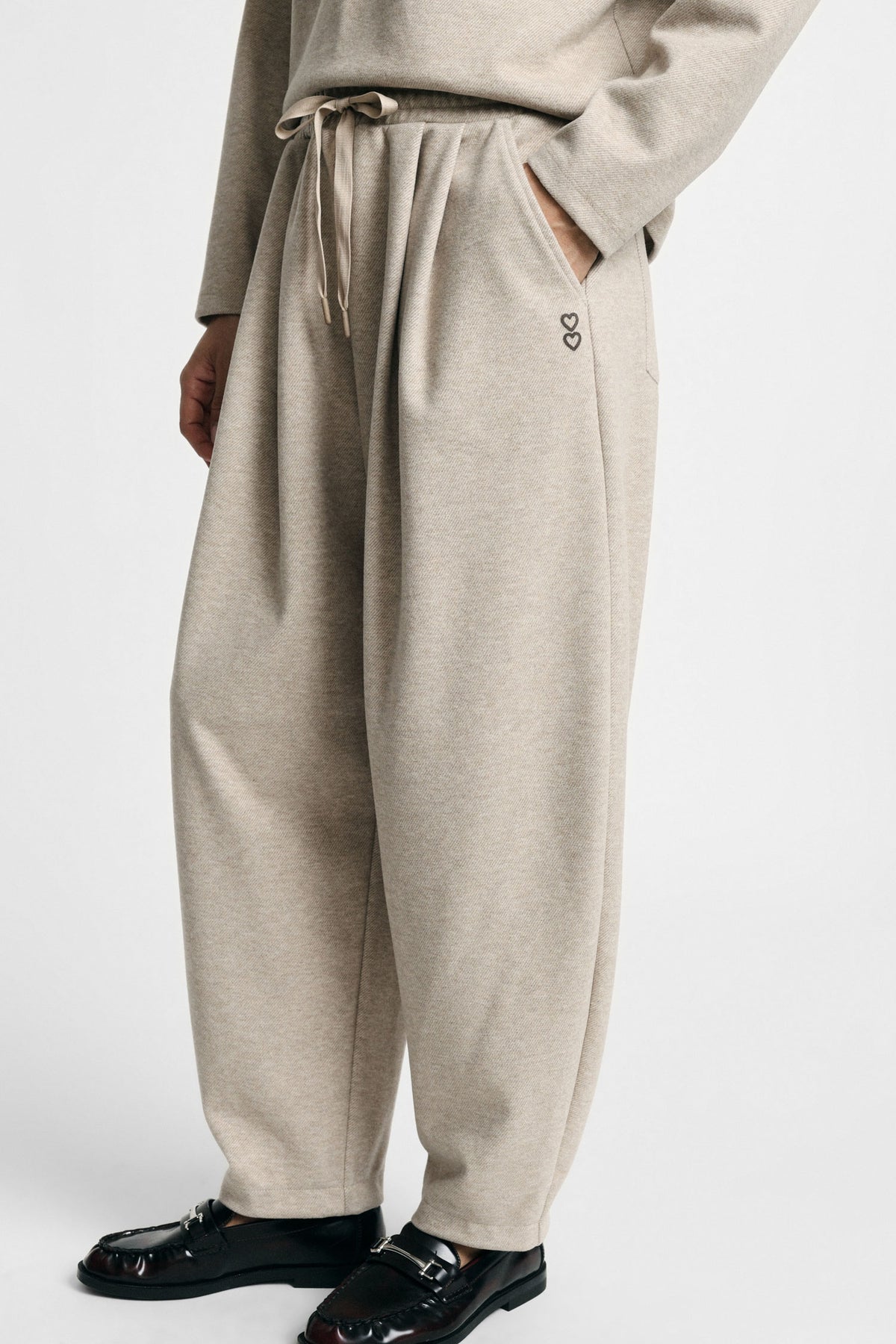 Pantaloni jogging fit con coulisse tasche laterali - Beige
