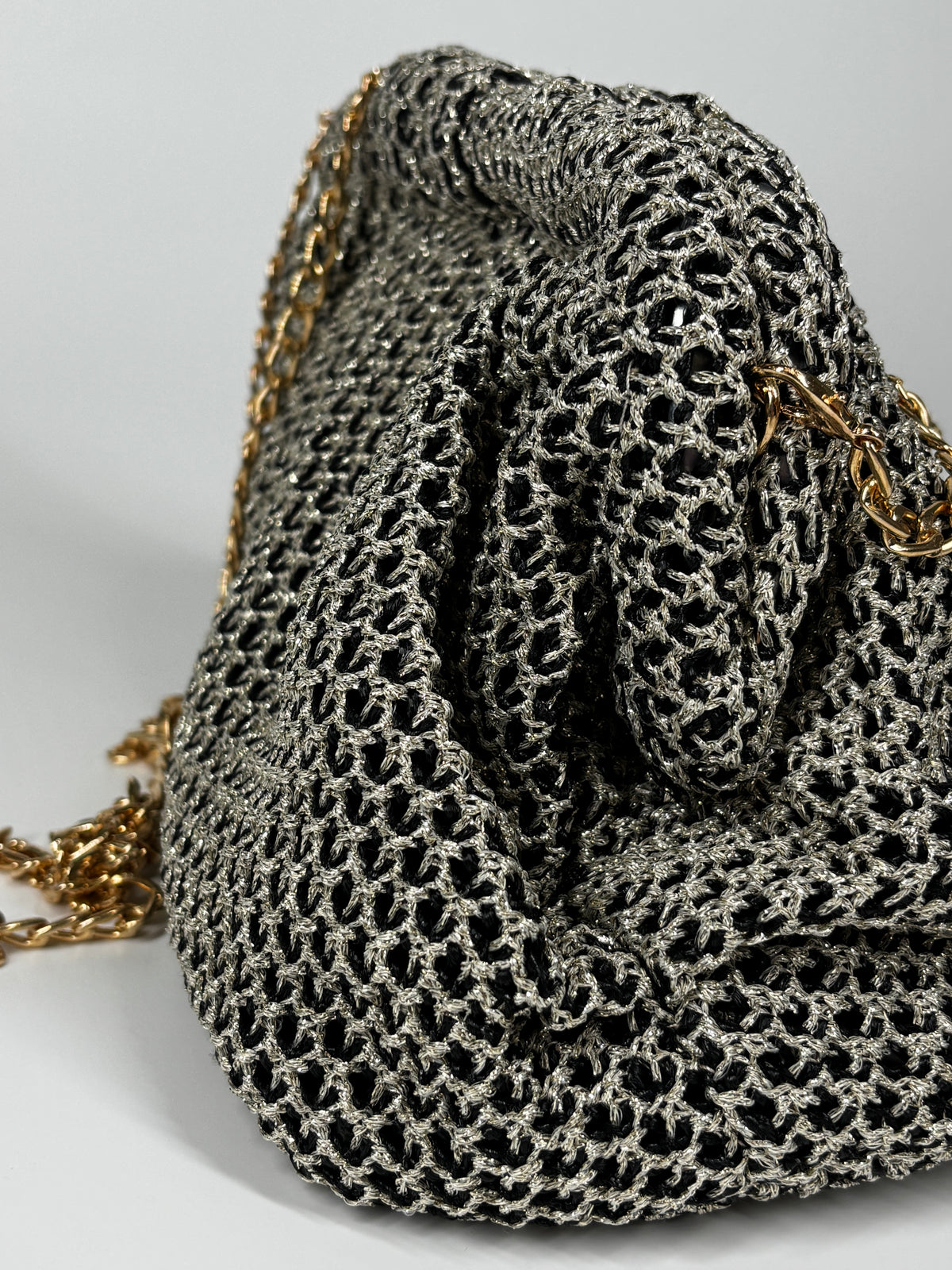 Clutch In tessuto - Nero e Oro