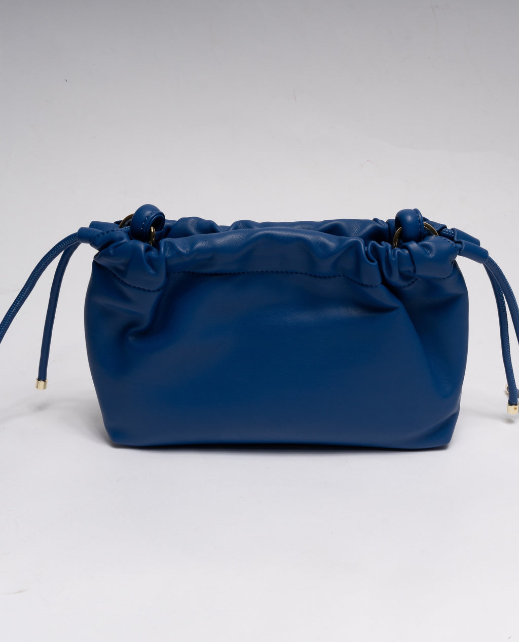 BLU | Minibag a sacchetta Gio Cellini "Vicky pop" in ecopelle liscia con borchie dorate