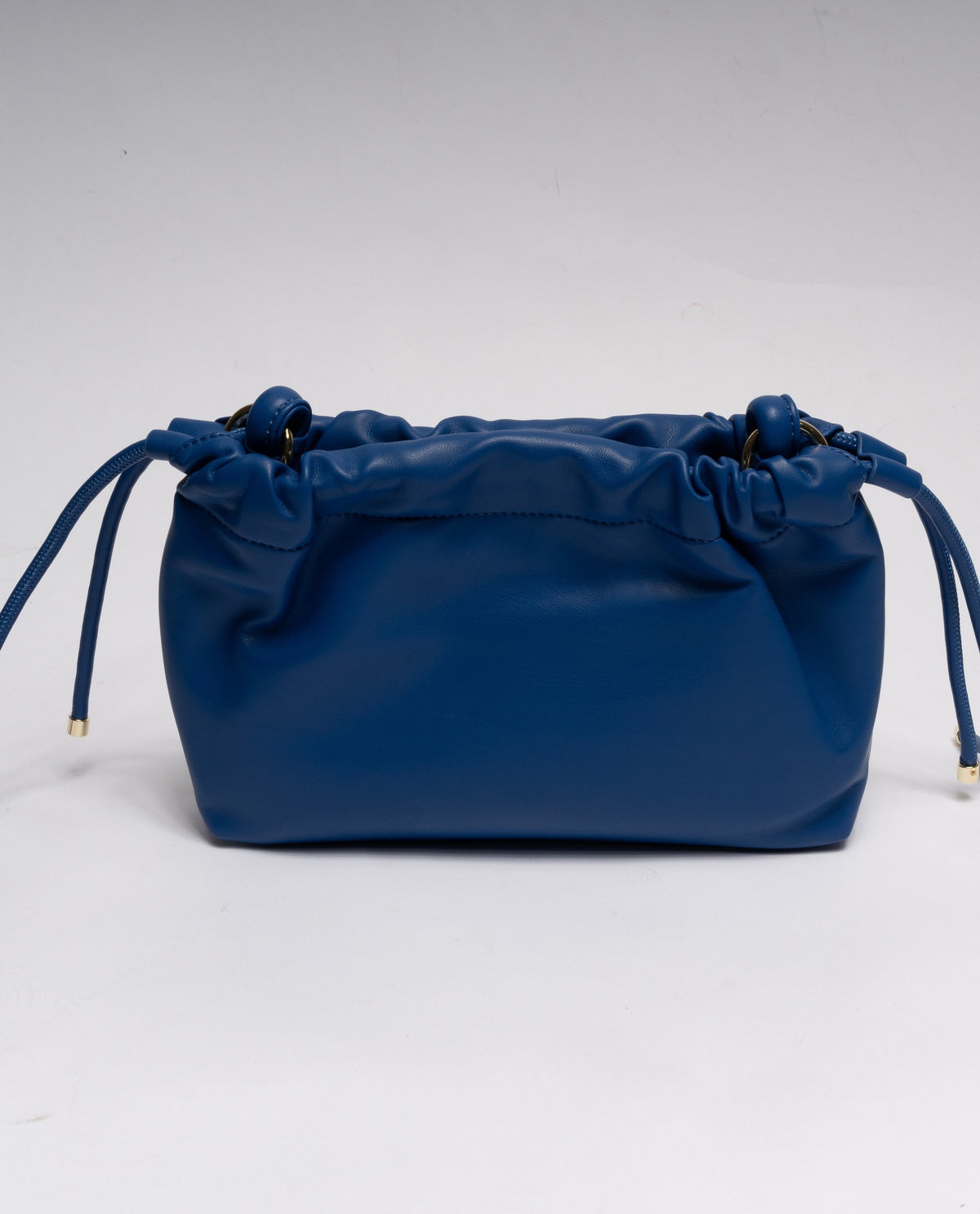 BLU | Minibag a sacchetta Gio Cellini "Vicky pop" in ecopelle liscia con borchie dorate