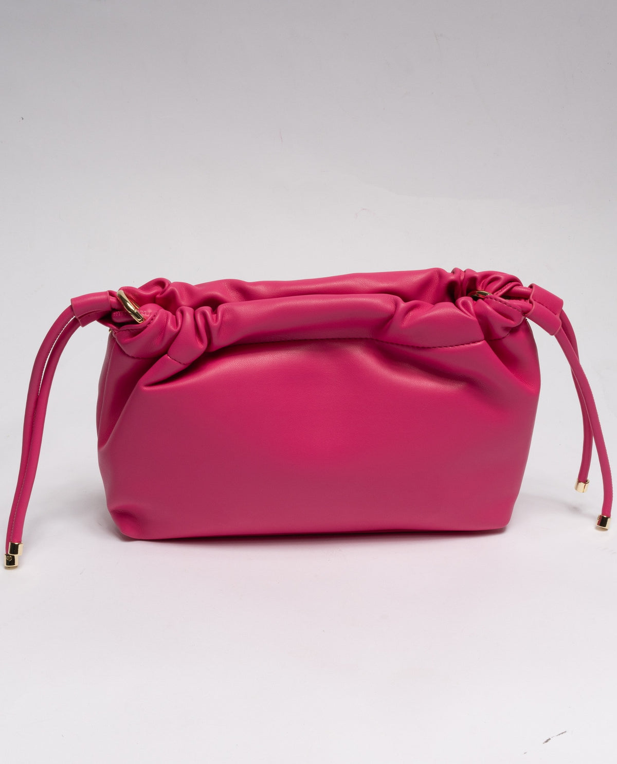 FUCSIA | Minibag a sacchetta Gio Cellini "Vicky pop" in ecopelle liscia con borchie dorate