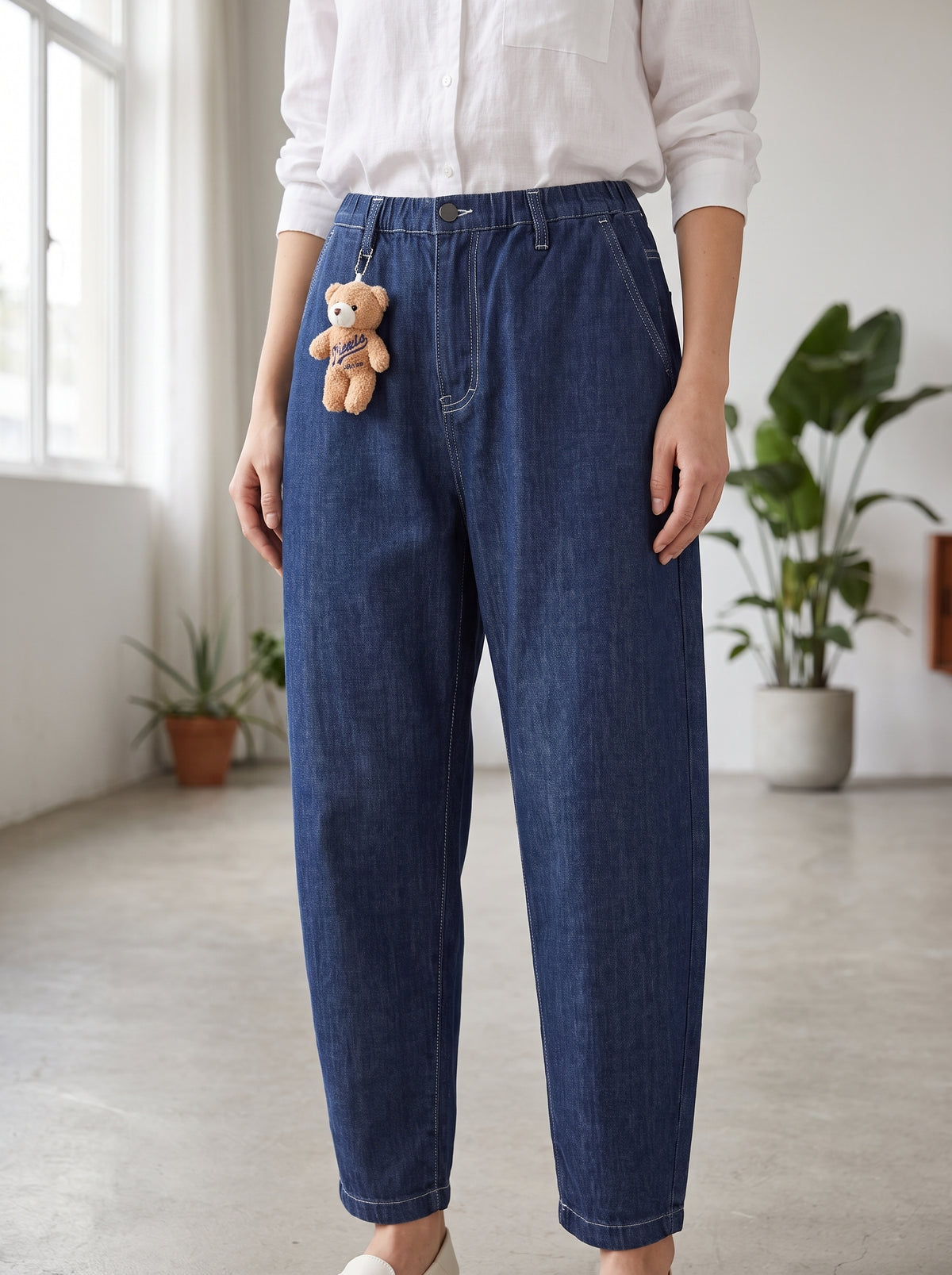 Jeans sstore bambina blu scuro carrot fit con orsetto